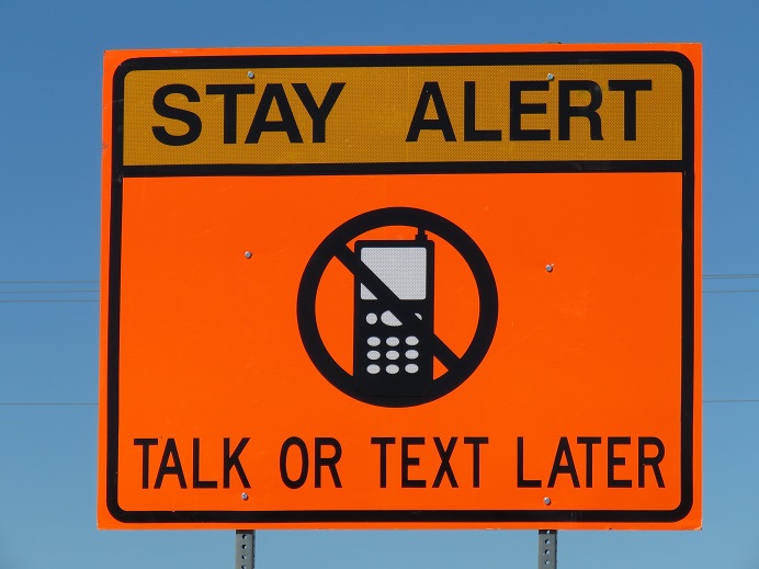 stay alert, talk or text later